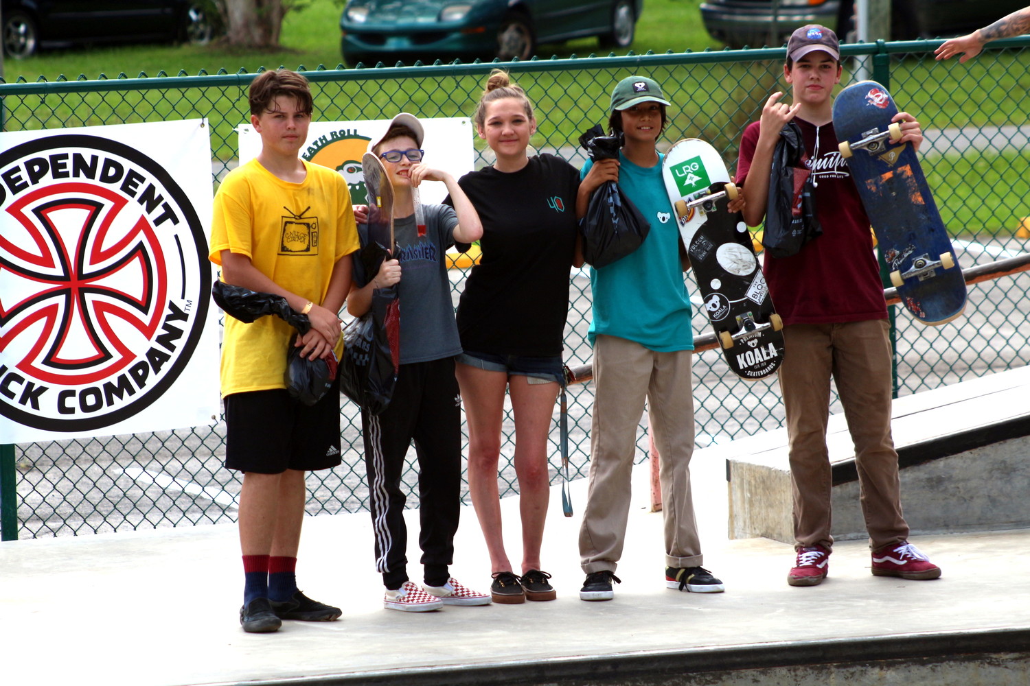 Winners in the 15-Unders included, left to right, Owen Kirkpatrick, Brody Harris (First place), prize girl Courtney Green, Marcus Caserias and John Lee.